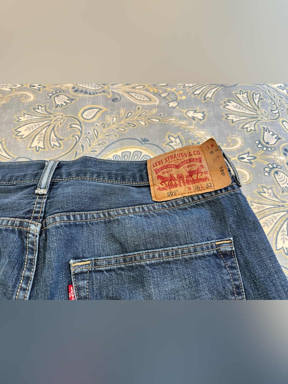 501 Levi's Men's Straight Blue Distressed Denim Jeans with Leather Patch
